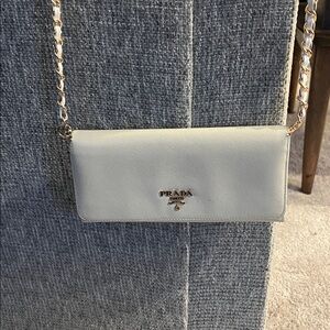 Prada Saffiano Off-White Leather Wallet on a chain .
